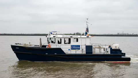 A PLA Harbour Service Launch, Kew, with river background