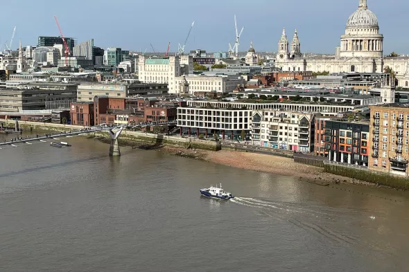Harbour Service Launch through Central London with St Pauls in the background