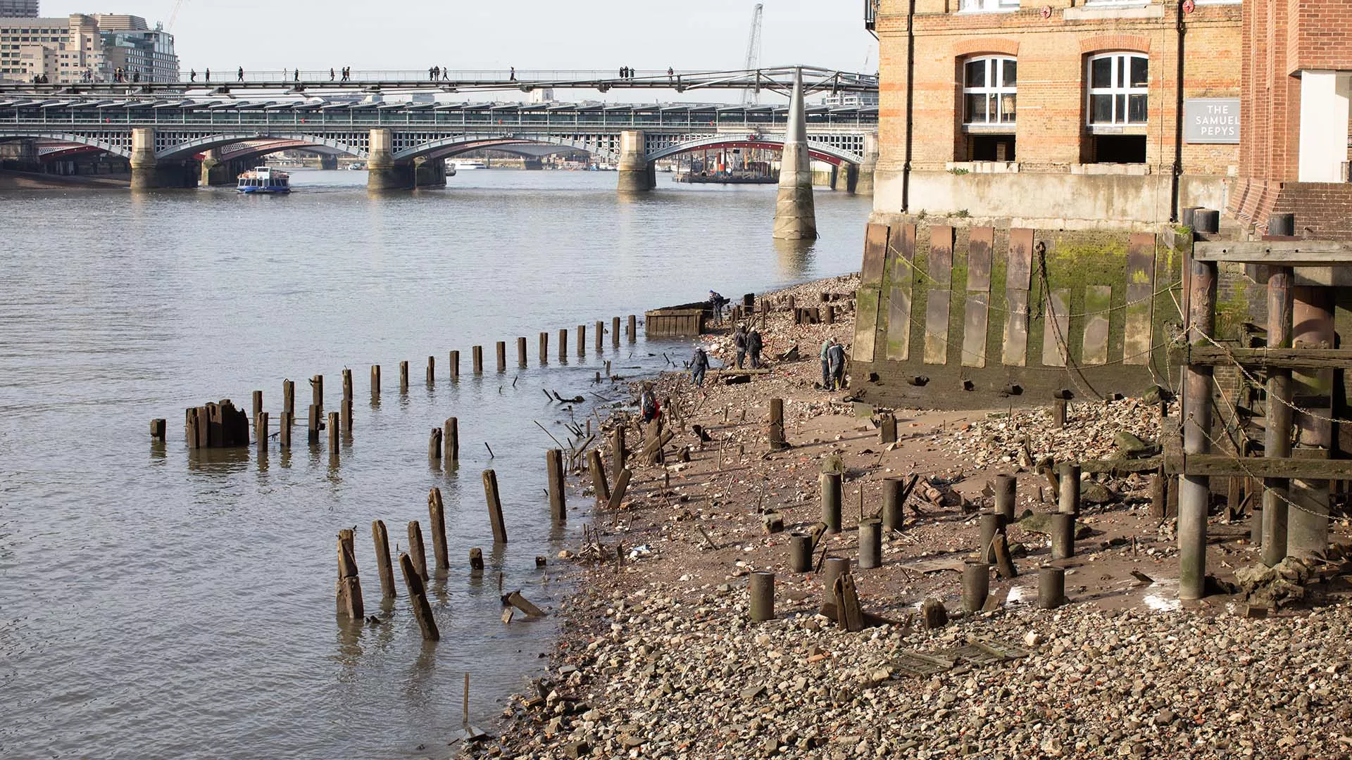 Mudlarks on the River Thames foreshore near Queenhithe