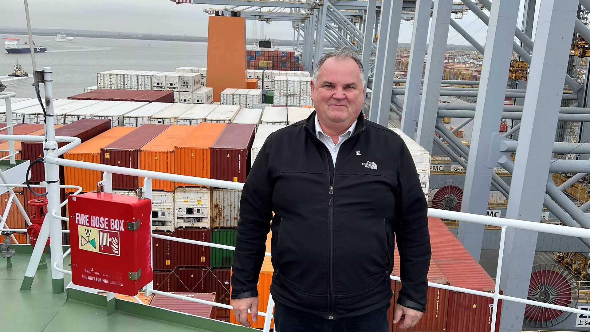 Hywel Pugh on board a vessel on the Thames